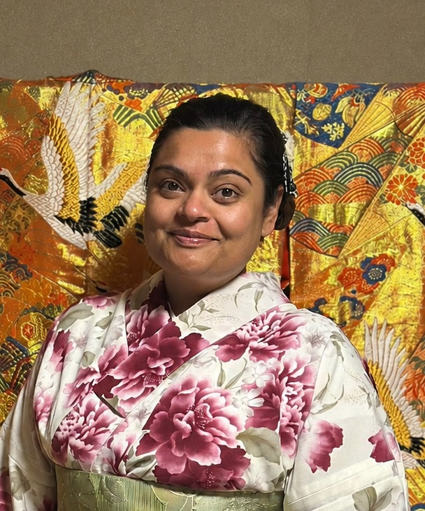 Portrait placeholder for Emma Kamo